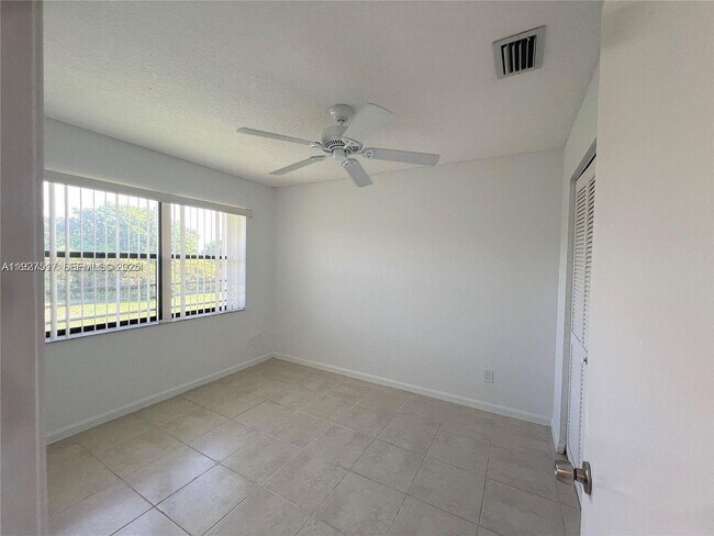 Building Photo - 11044 Royal Palm Blvd