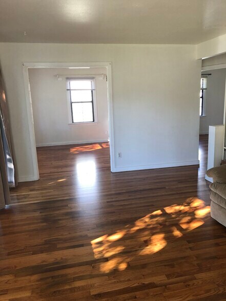 front bedroom off the living room with french doors could make a great home office - 1788 Blakeslee Ave