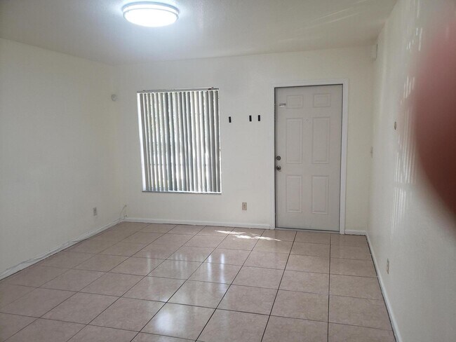 Building Photo - 8587 SW 23rd Ct