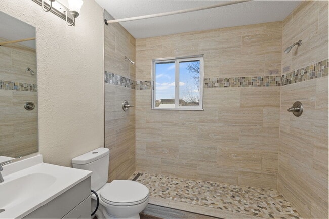 Building Photo - Spacious Split-Level Home with Finished Basement, Deck, Fenced Yard & 2-Car Garage