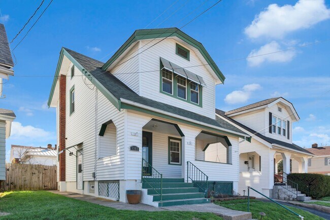 Building Photo - NORWOOD – Stunning Old-World Charm with Modern Comforts