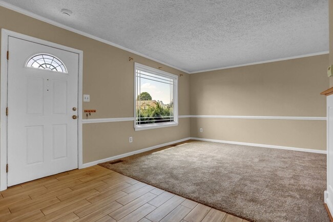 Building Photo - Spacious 4-Level Home with Deck, Workshop ...