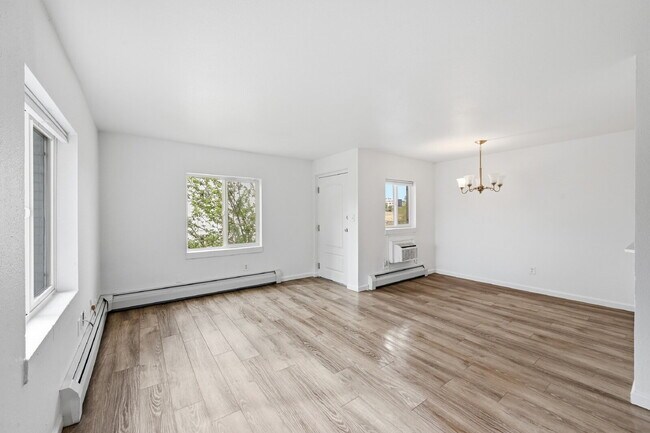 Building Photo - $1,440.95 with $300 Off the first month's rent,  2 Beds - 1 Bath, Condo in Denver with Granite Co...