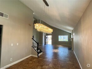Building Photo - 7893 W Gilmore Ave