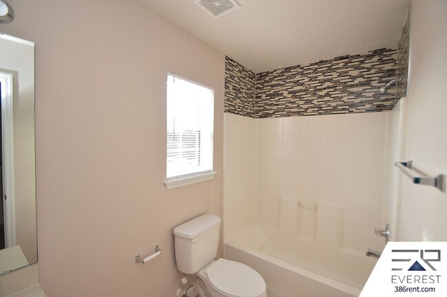 Building Photo - SPACIOUS, FULLY FENCED 4/2.5/2 IN DESIRABLE MATANZAS WOODS