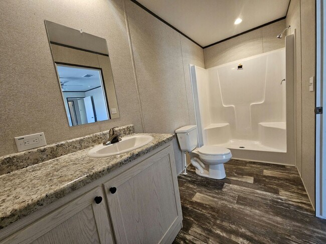 Building Photo - 6591 Hidden Oaks Dr