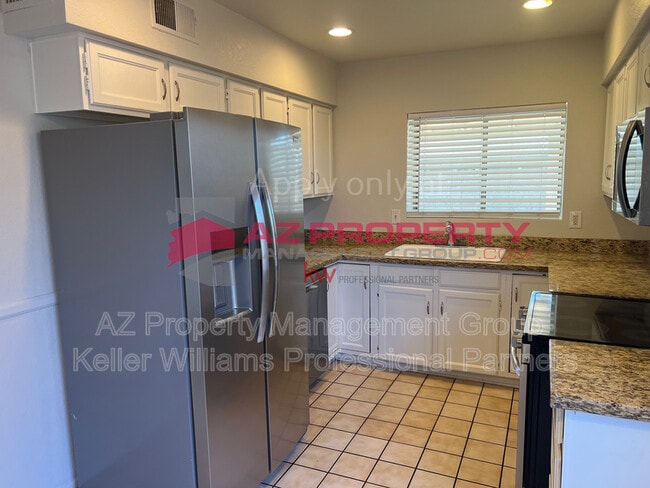 Building Photo - 7039 W Cameron Dr