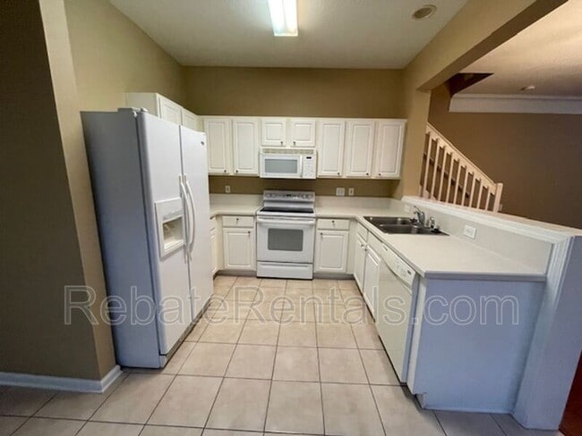 Building Photo - 7478 Scarlet Ibis Ln