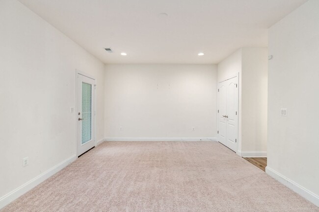 Building Photo - Your Next Home: Modern 3-Level Townhome with Garage, Deck & Huge Flex Space