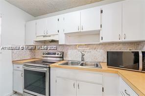 Building Photo - 6055 W 19th Ave