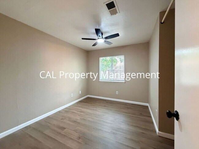 Building Photo - Spacious 4-Bedroom Home with 2-Car Garage & Backyard Oasis