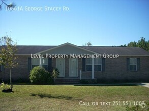 Building Photo - 10661 George Stacey Rd