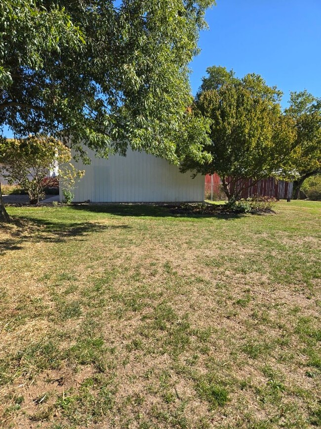 Building Photo - Fall In Love With This Unique Farmhouse!