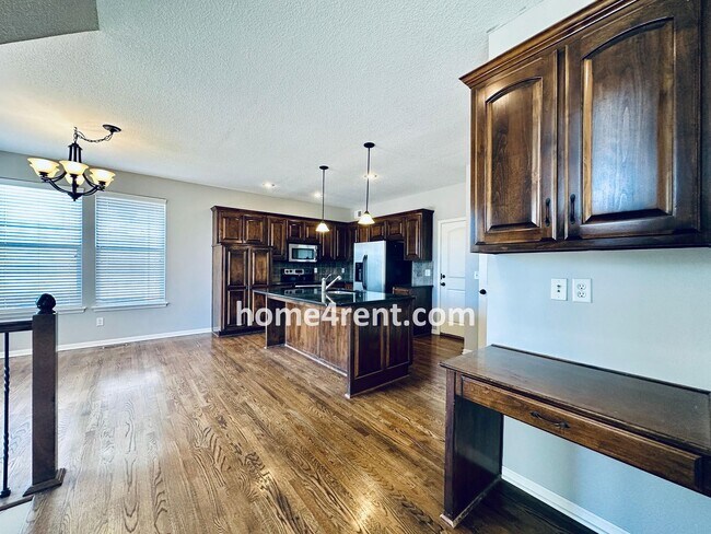 Building Photo - Gorgeous Olathe, 5 BR Home w/ Wood floors,...