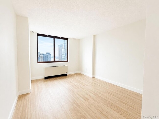Building Photo - 4-74 48th Avenue Unit 30-J