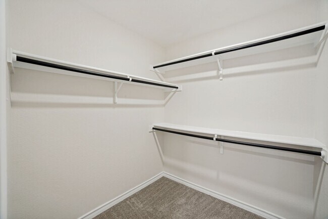Building Photo - Welcome home to this 4/2/2 nestled in Whisper Falls