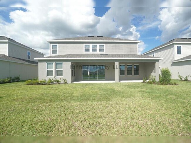Building Photo - Stunning 5-Bedroom Lakeview Home in River Landing, Wesley Chapel