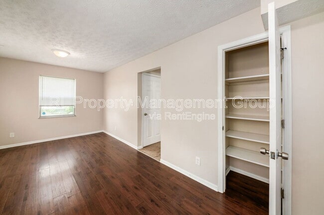 Building Photo - 7179 Feather Ct