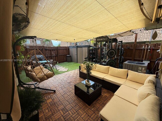 Building Photo - 6580 W 24th Ct