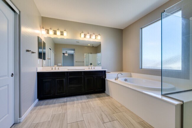 Building Photo - Beautiful Next-Gen Home with Private Entry Suite & Spacious Backyard