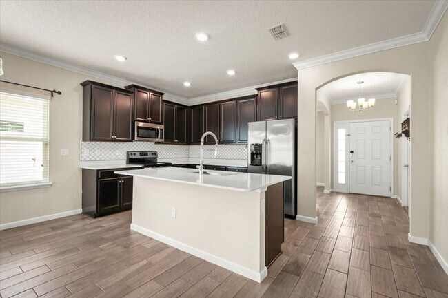 Building Photo - Beautiful 3/2 with Fully Fenced Backyard a...