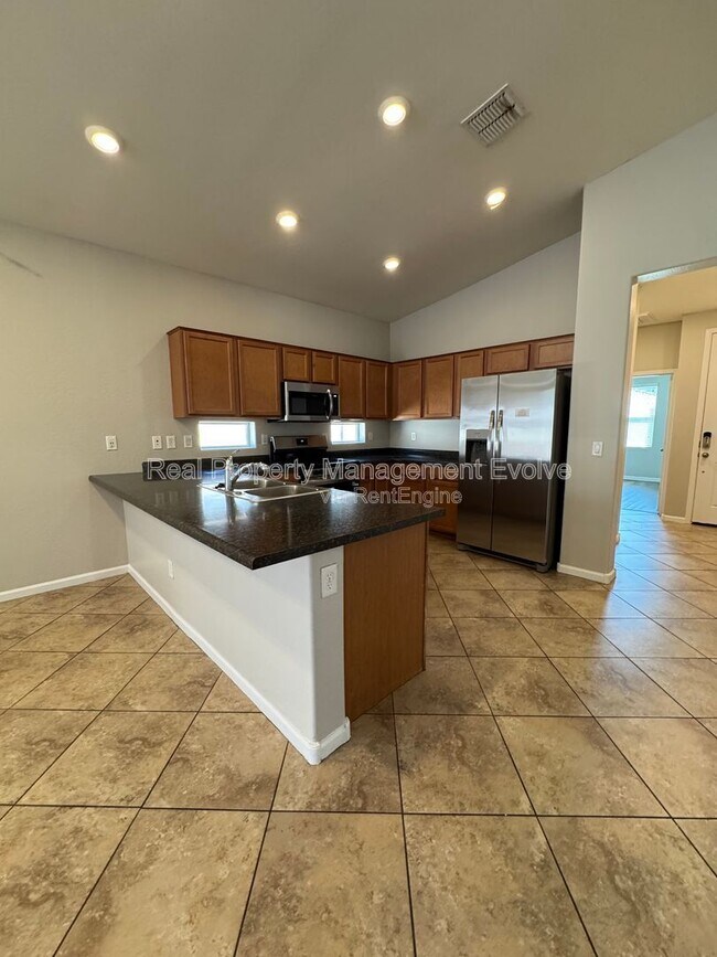 Building Photo - 13014 W Lamar Rd