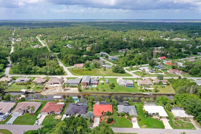 Building Photo - Port Charlotte Waterfront Pool Home - Grea...