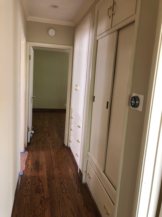 hallway with built-in linen closet - 827 N Kemp St