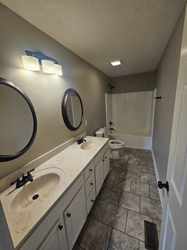 Building Photo - Discover comfort, convenience, and modern ...