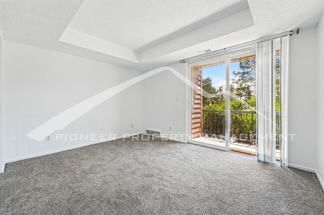 Building Photo - Charming Condo with Washer/Dryer and Patio