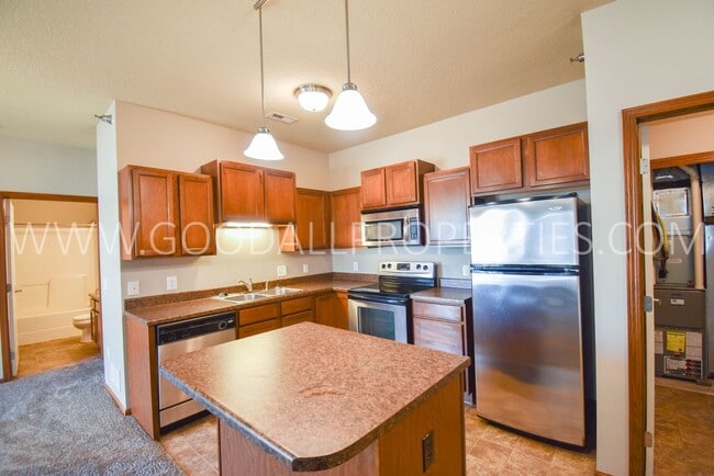 Building Photo - 2 Bedroom 2 Bath Condo w/ Garage on the gr...