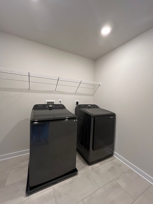 Building Photo - Move-in-ready Brookside Court townhome off...