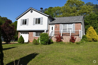Building Photo - "Charming 3-Bedroom 2.5 bath with Finished...