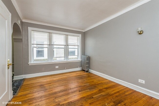 Hardwood flooring throughout - 3935 W Diversey