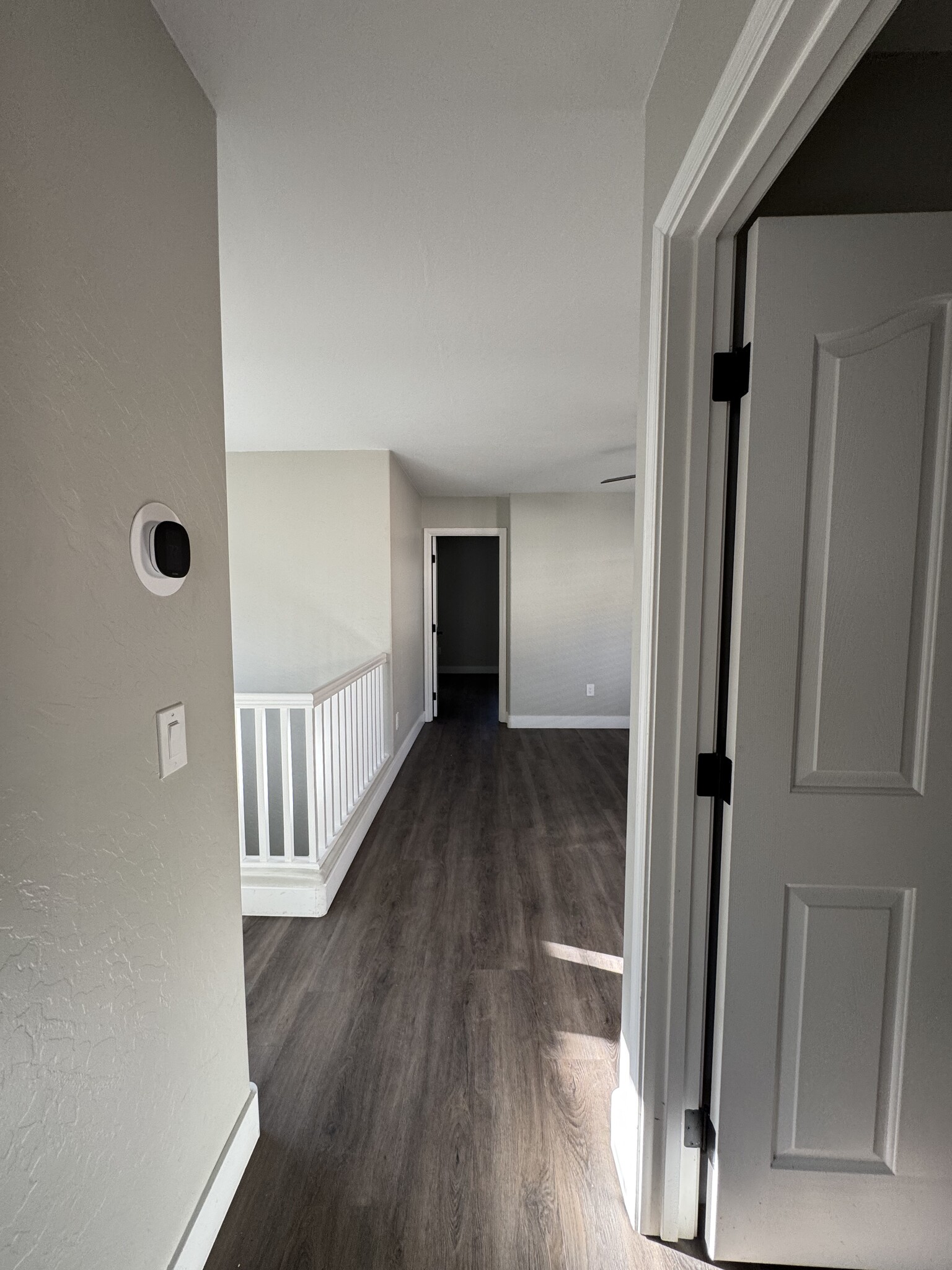 View from Hall to Loft, Primary Bedroom Beyond - 524 W Mountain Sage Dr