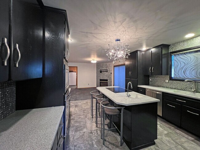 Building Photo - Stunning 4 Bedroom 2.5 Bath with Peek-a-Boo View of Puget Sound