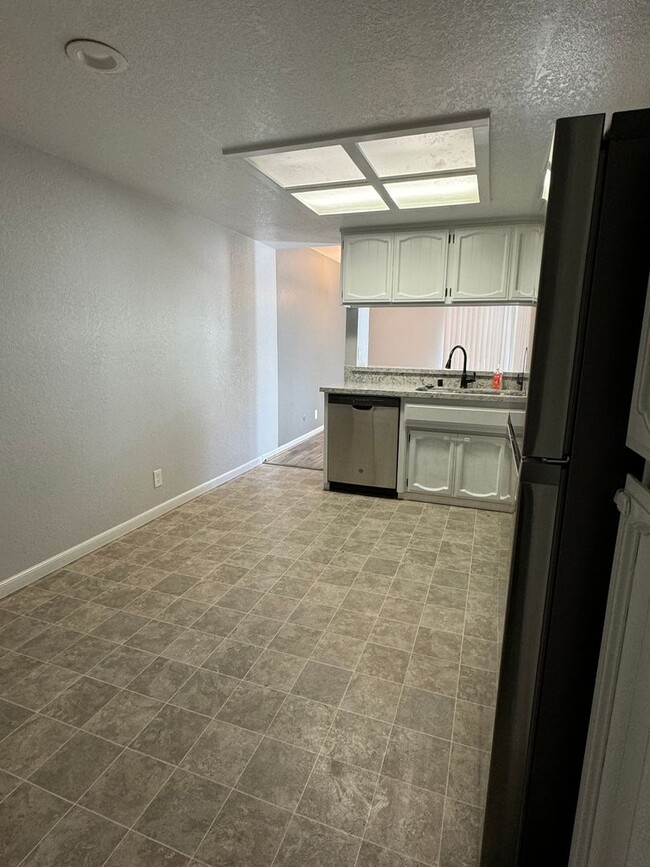 Building Photo - Remodeled 2-Bed, 2-Bath Condo for Rent Nea...