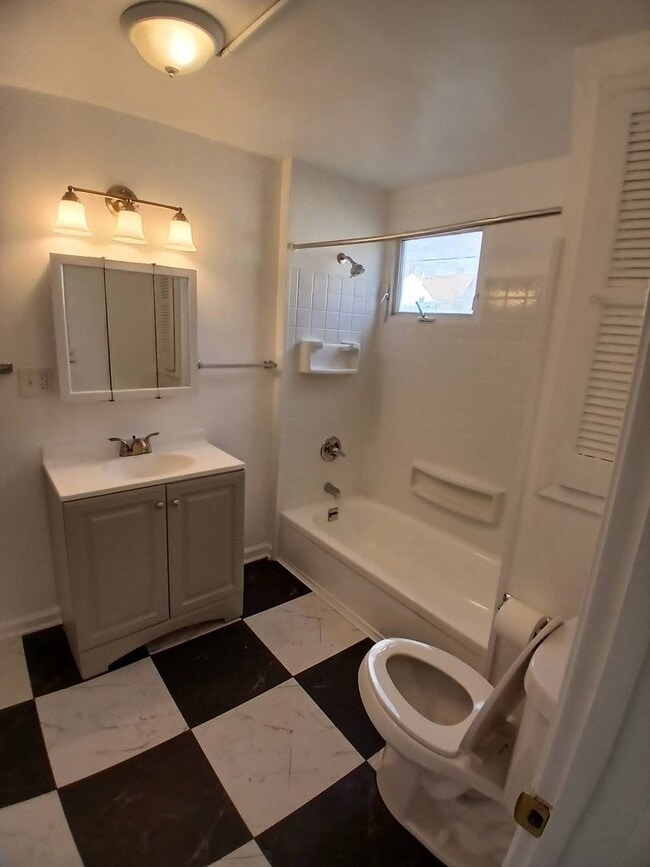 Building Photo - Newly Renovated 4BR/1BA Single-Family Home with Garage – Cleveland
