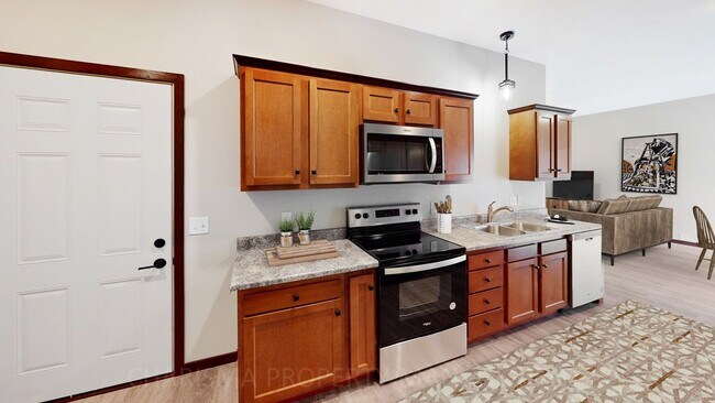 Building Photo - 3 BD, 2.5 BA TOWNHOME, DOUBLE ATTACHED GAR...