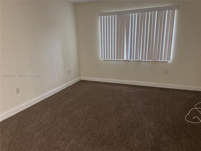 Building Photo - 4235 N University Dr
