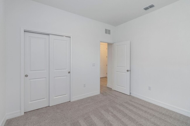 Building Photo - Beautiful Brand New Energy Efficient 4/2 C...