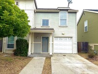 Building Photo - Freshly Painted w/ New Carpets 3 Bedroom, 2 Bath With Attached Garage
