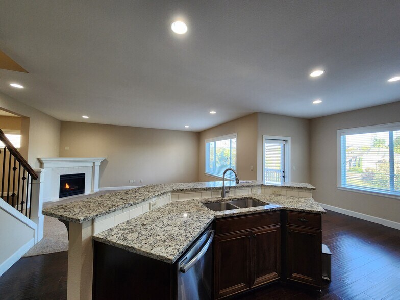 Granite Countertops, and Family Room - 6128 NW Trowbridge Dr