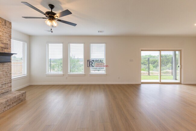 Building Photo - Beautiful 4 Bedroom Home with Covered Patio & Hill Country Views