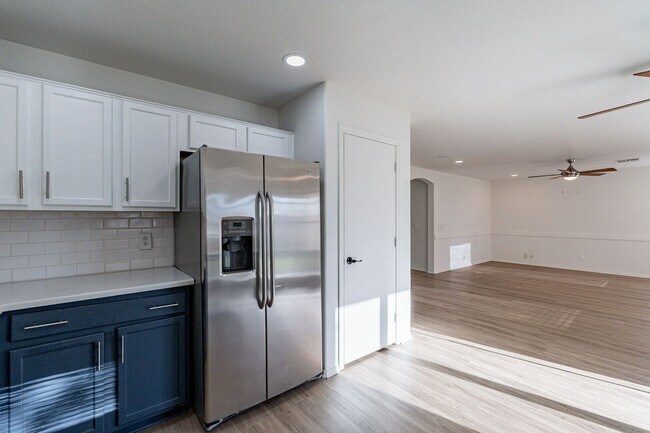 Building Photo - Spacious 5-Bedroom Home with Open Layout & Private Backyard