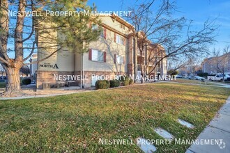 Building Photo - $250 OFF 1ST MONTHS RENT!  Mid-Level  3-be...