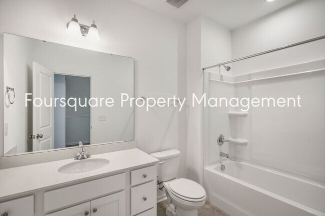Building Photo - Spacious 3-Bed / 2.5-Bath Townhome with First-Floor Den, Hardwood Floors & 1-Car Garage – Wendell...