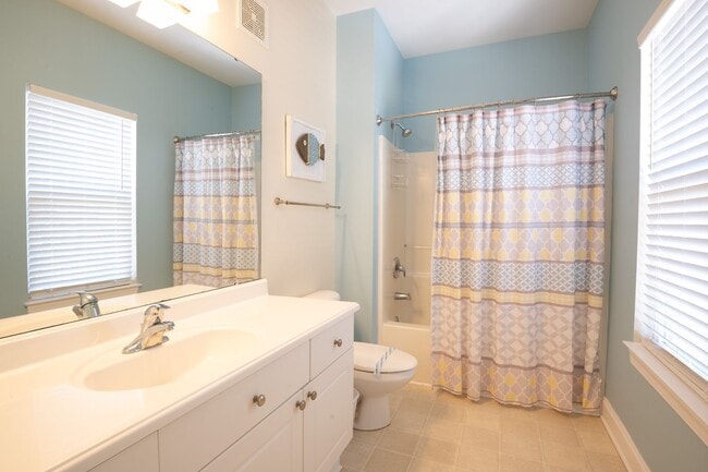 Building Photo - PRICE REDUCTION! LIVE AT THE BEACH FOR THE...