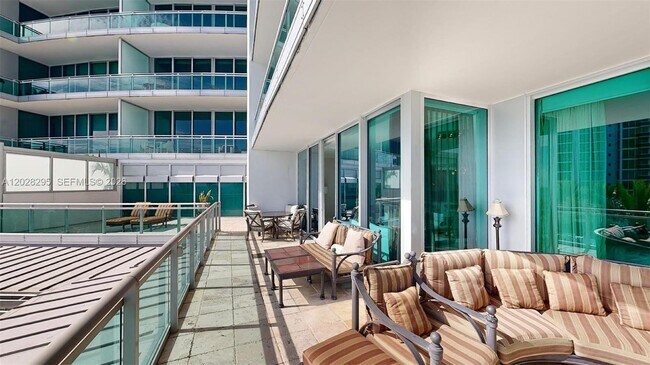 Building Photo - 10295 Collins Ave