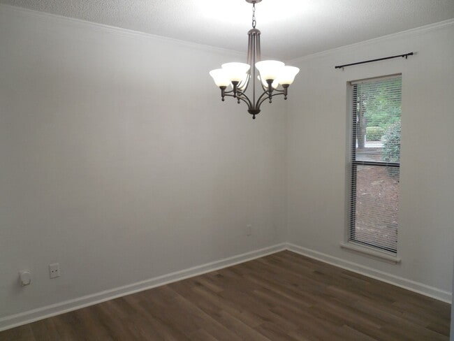 Building Photo - End Unit Condo Available now